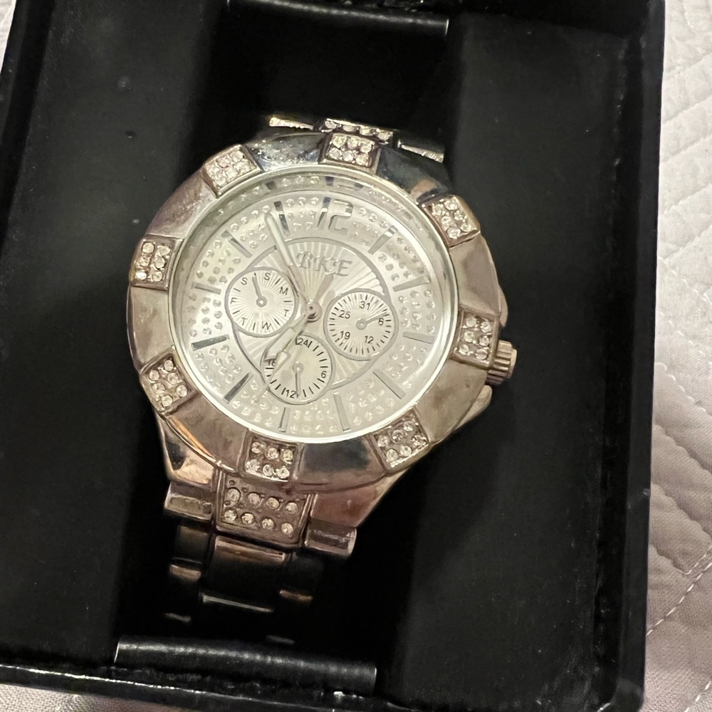 Women’s BKE silver diamond watch